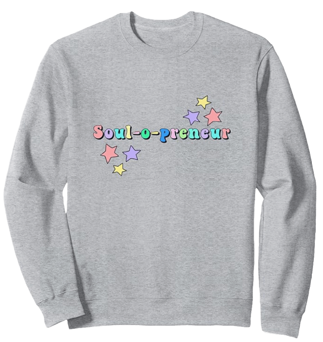 a grey sweatshirt featuring stars and the word soul-o-preneur, part of the business unfolding merchandise