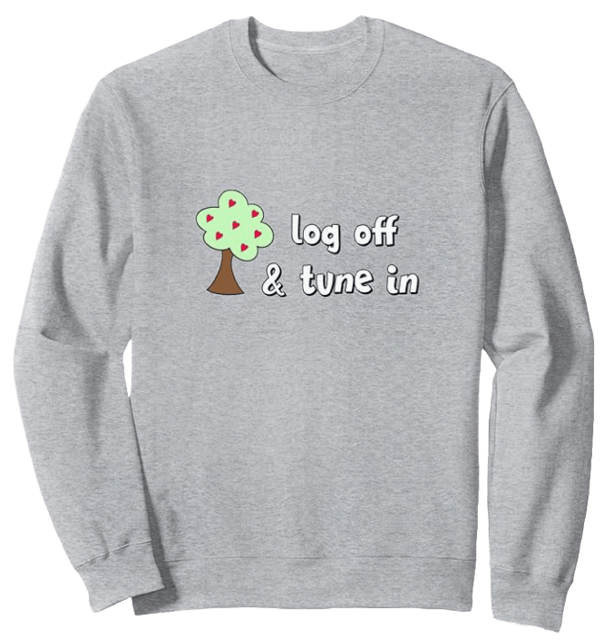 a grey sweatshirt featuring tree with red hearts and the words log off and tune in, part of the business unfolding merchandise